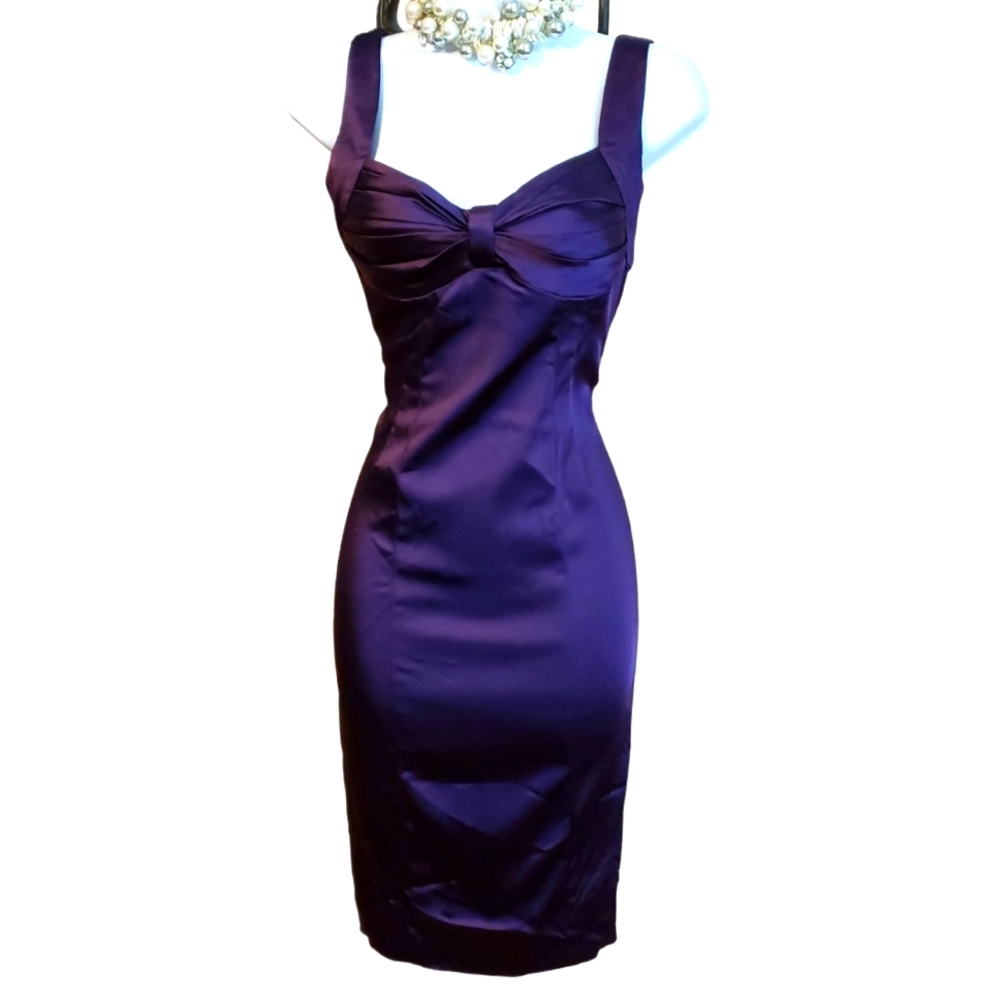 Beautiful Royal purple body con cocktail address.